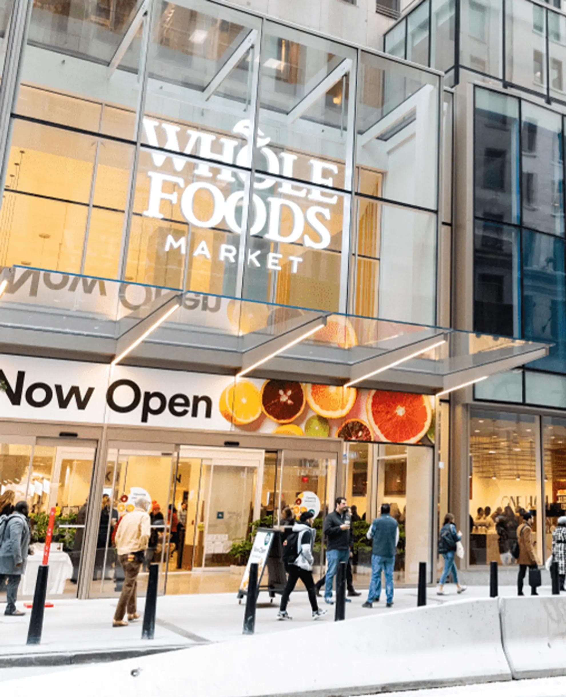 Whole Foods store front in a city.